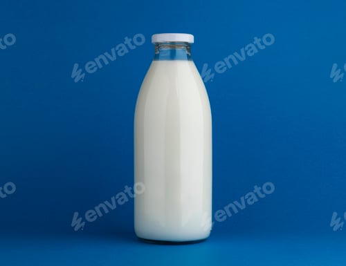 Preview: Glass milk bottle mock up on blue background