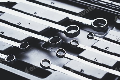 Preview: Collection of chrome wrenches organized in a tool case ready for use during a mechanical project in