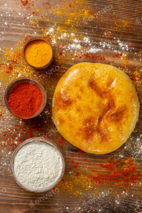 Preview: top view tasty baked pie with seasonings on brown wooden desk pie cake hotcake food