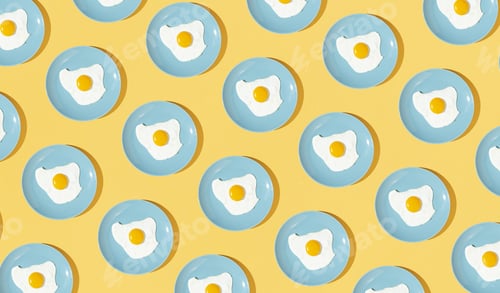 Preview: Miniature blue plates with fried eggs on a yellow background