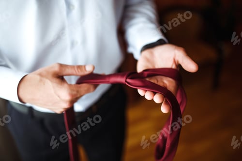 Preview: Luxury groom in suit. Businessman. Morning Groom Fees. The beginning of wedding day. Men's fashion.