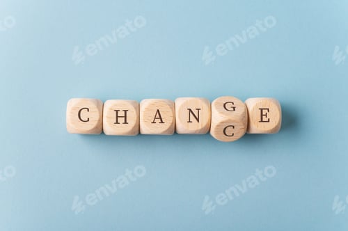 Preview: Word Change changing in to Chance spelled on wooden dices