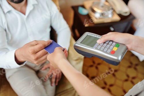 Preview: Hotel guest paying with card
