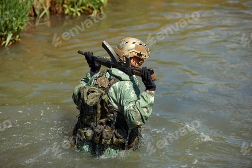 Preview: Full military experience - One day commando - running through the water with automatic rifle replica