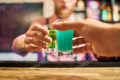 Preview: People Clinking Shots in Bar