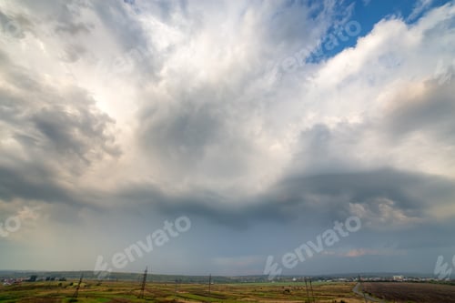 Preview: Blue sky covered with white puffy clouds
