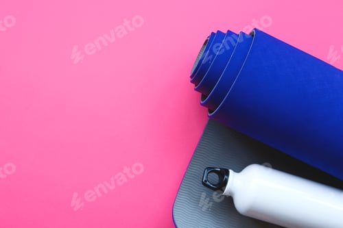 Preview: Bright blue yoga mat on a pink background