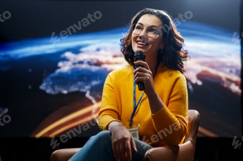 Preview: woman is giving a presentation at conference