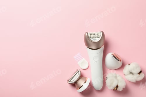 Preview: Epilator with nozzles on pink background, space for text