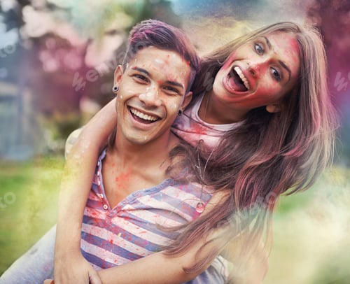 Preview: Happiness in color. Shot of happy friends having fun with powder paint.