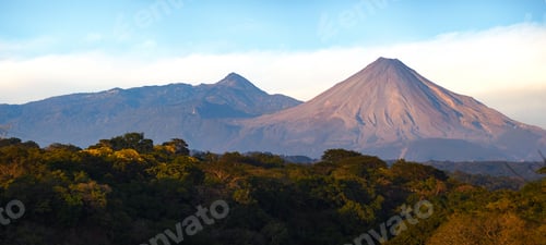 Preview: A breathtaking view of two majestic volcanoes in Colima, Mexico.