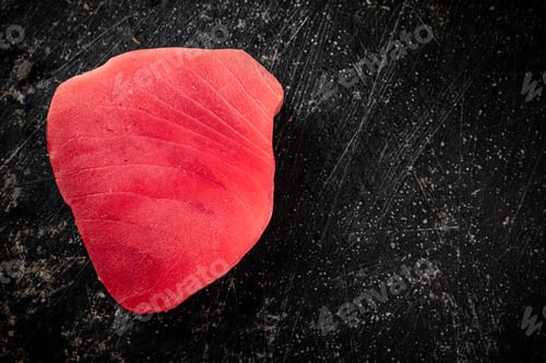 Preview: Raw tuna steak on the table.