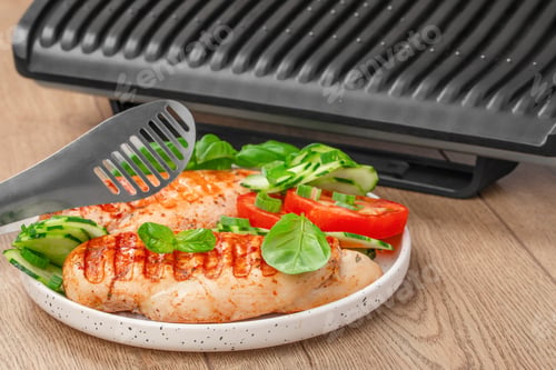 Preview: Grilled chicken breasts with fresh basil, cucumbers, and tomatoes