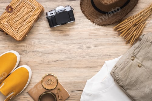 Preview: summer travel flat lay of traveller accessories set.