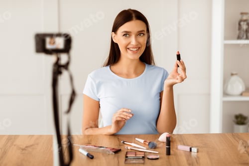 Preview: Woman Making Makeup In Front Of Camera Creating Video Indoor