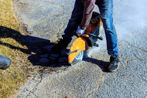 Preview: Repairing damaged asphalt cracks before installing a new layer asphalt is part of road restoration