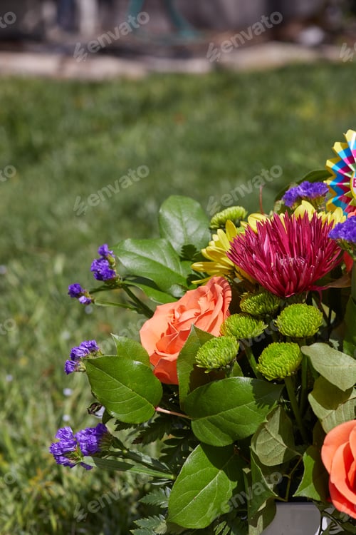 Preview: Fresh flowers at the garden with green leaves