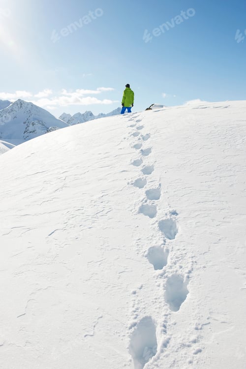 Preview: Man standing in snow with footprints, Kuhtai, Austria