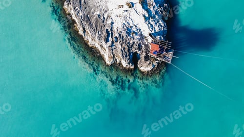 Preview: Beautiful high angle view of rocky cliffs on the water on Beach of Architiello of San Felice, Italy