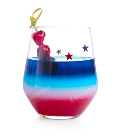 Preview: Layered cocktail in colors of American flag with ice and cherries isolated on white