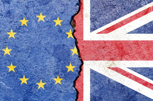 Preview: View of EU VS UK national flags isolated on broken cracked concrete wall background