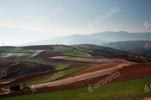 Preview: Panoramic view of chinese agriculture landscape with mountains and hills in the morning.