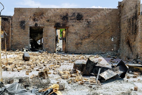 Preview: Burned abandoned burned dark walls with dust selective focus in the USA burns violent of a burnt by