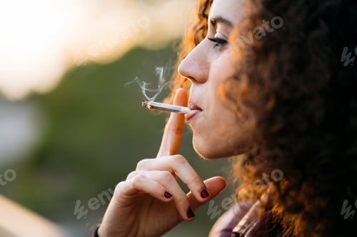 Preview: Smoking young woman