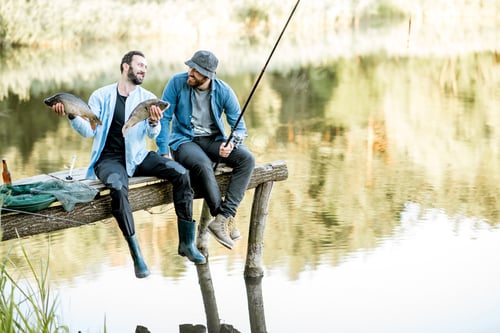 Preview: Fishermen with fish on the lake