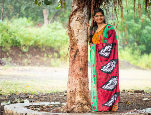 Preview: Happy young beautiful Indian woman at the park outdoor
