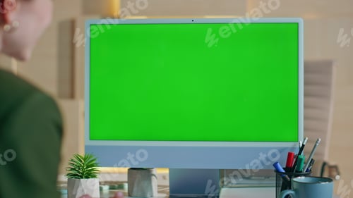 Preview: Businesswoman videocalling mockup computer at modern corporate office close up.