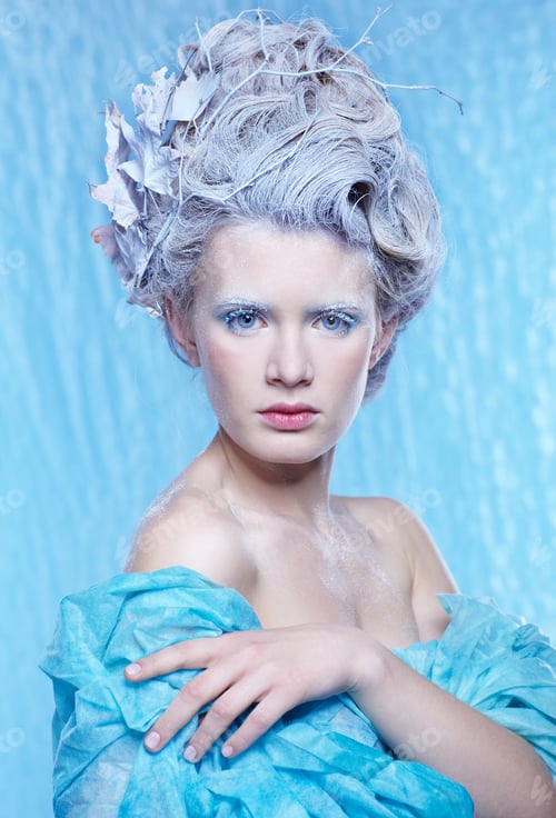 Preview: Fantasy Portrait Of Beautiful Young Woman Imaging Ice Fairy On Frozen Blue