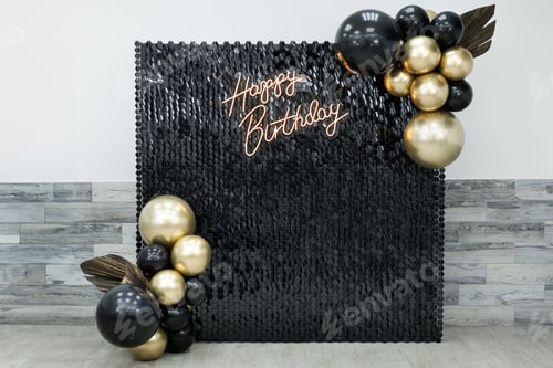 Preview: Shiny black sequins and balls as decorations. A photo zone for a photo shoot and a holiday.