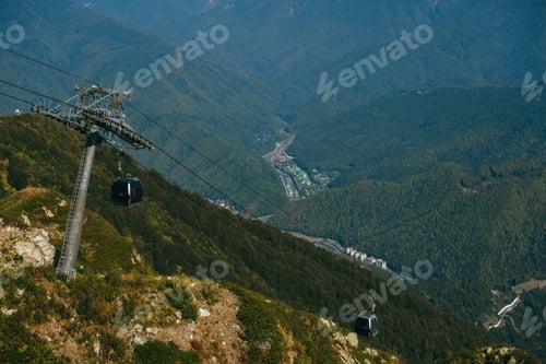 Preview: aerial view from the cable car to the Rosa Khutor resort in Sochi, Russia against Caucasus mountains