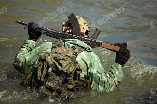Preview: Full military experience - One day commando - running through the water with automatic rifle replica