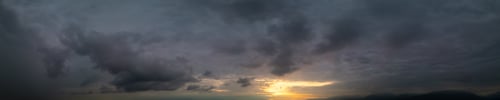 Preview: Panoramic View of Cloudscape during a colorful sunset or sunrise.