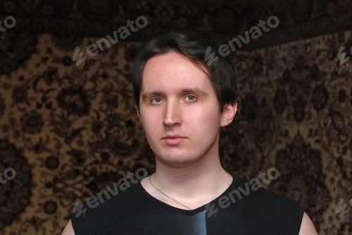 Preview: Portrait Of Young Funny Man In The Room
