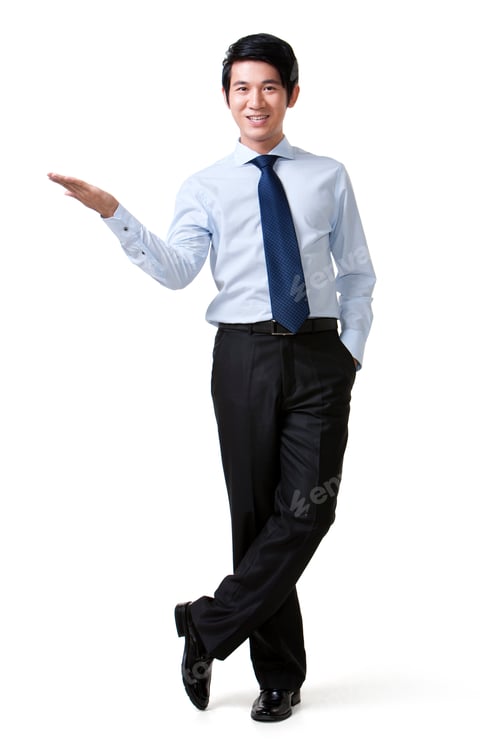 Preview: Portrait of a Confident Businessman With Arm Raised