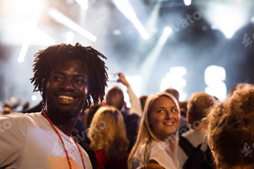 Preview: Friends having fun at music concert
