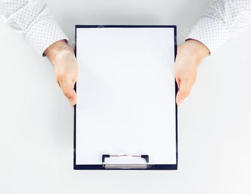Preview: Clipboard on a white table. close up
