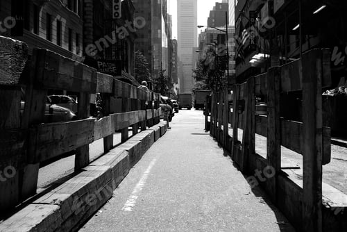 Preview: New York, USA - October 5, 2018: Wooden fences on the streets of NY during a maintenance work.