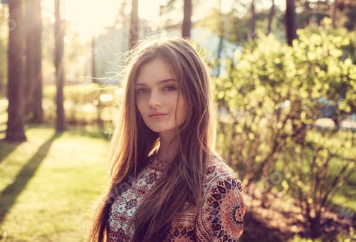 Preview: Female posing in a summer park.