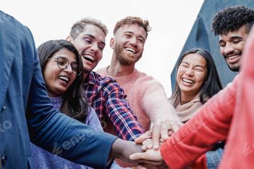 Preview: Diverse people celebrating together stacking hands outdoor - Focus on gay man wearing make-up