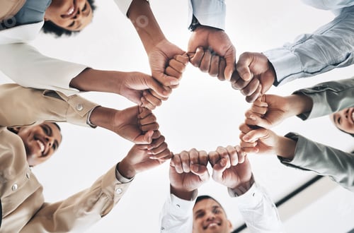 Preview: Team building, circle or happy business people fist bump for motivation in office meeting together.
