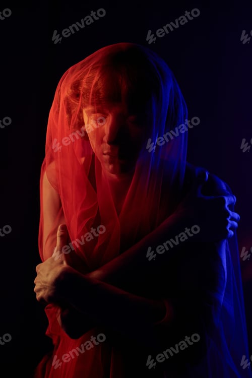 Preview: Young Man Hugging Himself