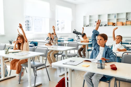 Preview: Children learning in a school classroom