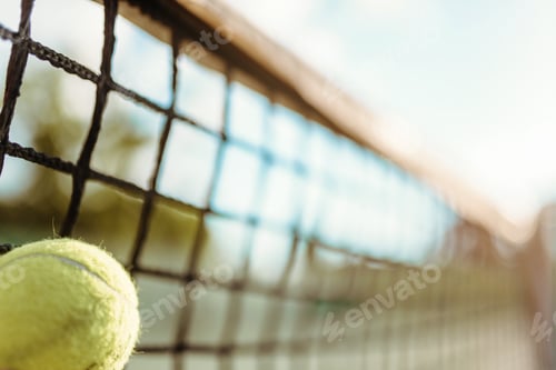 Preview: Ball in net closeup, big tennis concept