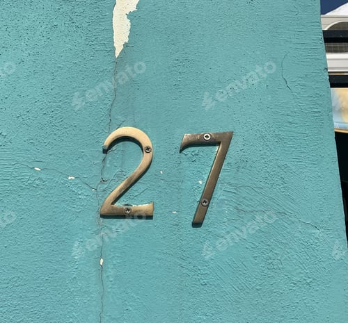 Preview: Closeup shot of number 2 in the address on the building wall