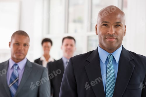 Preview: Business people. A team of people, a department or company. Three men and one woman.