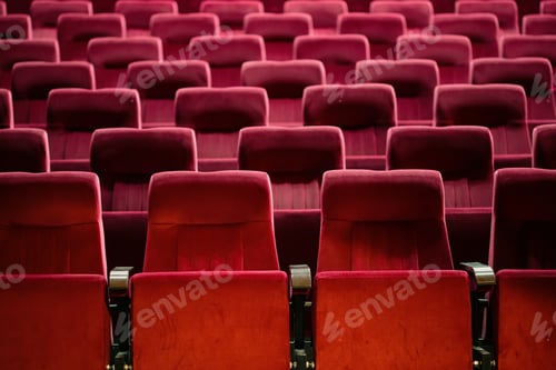 Vista previa: Sillas rojas vacías para el público en el teatro